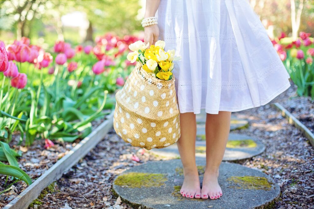 Lady_standing_on_garden_path